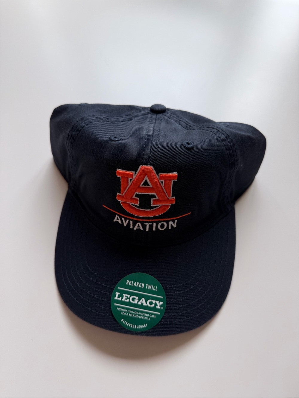 Legacy Navy Hat with Orange Auburn University 
Aviation Logo